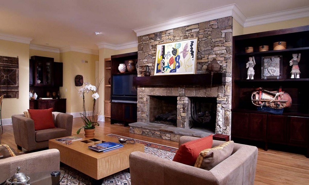 New metropolitan looking family room is a juxtaposition from the previous traditional outdated family room