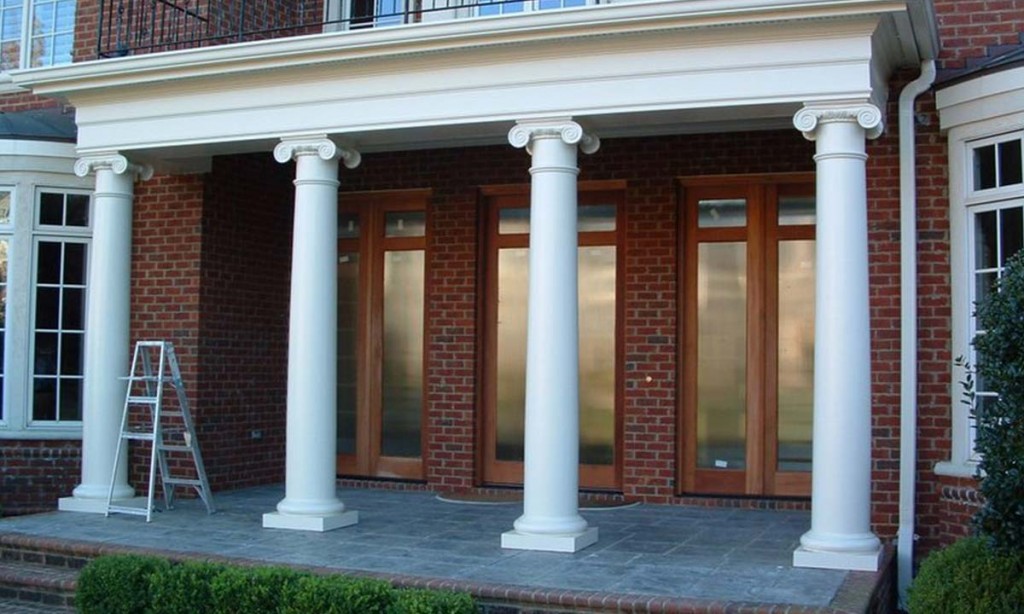 New streamlined front columns replacing a traditional brick exterior