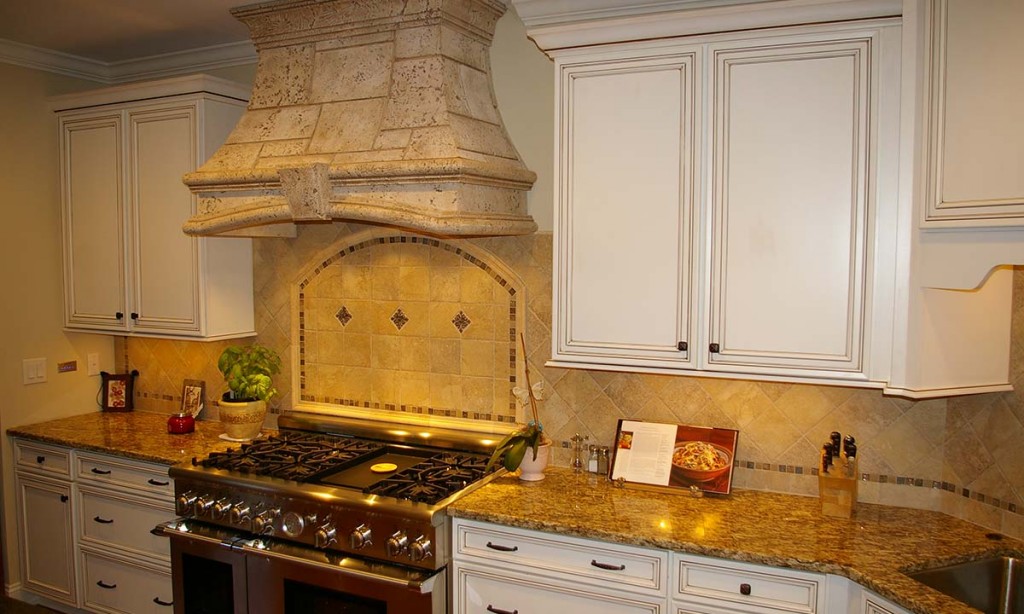 "After" photo showing a different angle of the granite countertops and tile backsplash