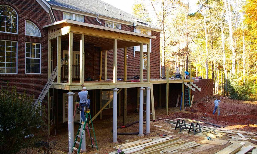 Construction of screened porch addition and deck renovation