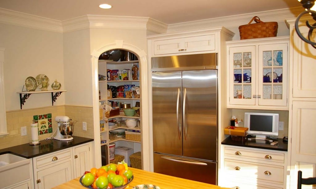 After kitchen remodel with view of pantry and refrigerator