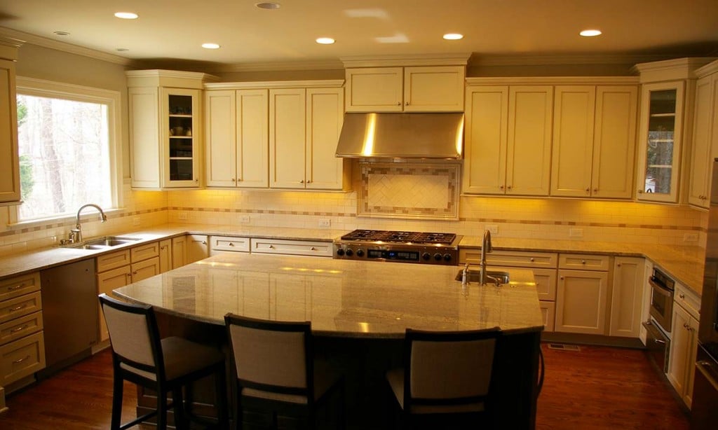 Kitchen remodeling "after" photos show reconfigured wall and layout