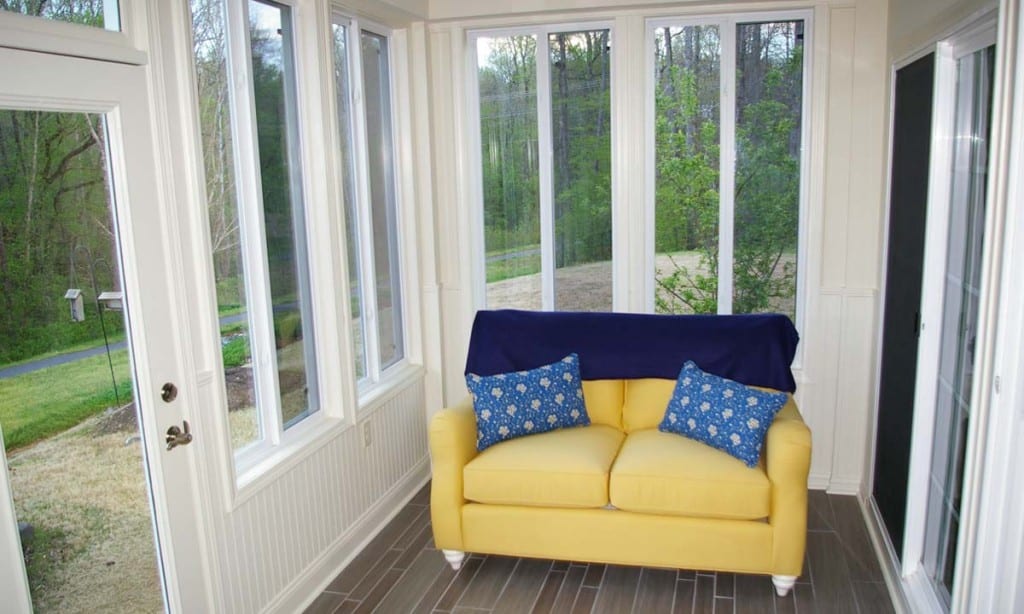 Interior view of new sunroom after converting the screened porch