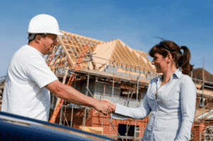 Contractor Shaking Hands with Happy home Owner
