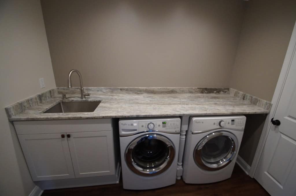 laundry room addition with granite countertops