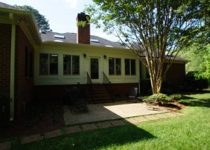 after exterior photo of sunroom and bonus room addition
