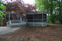 exterior after photo of screened prch addition