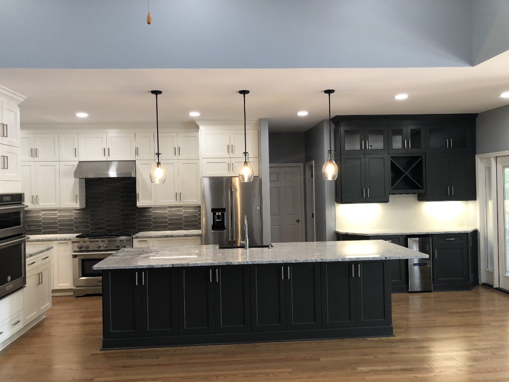 after pitcure of kitchen remodel with black island