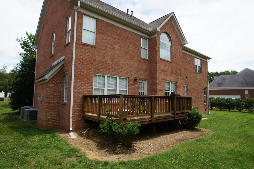 before picture of back deck before sunroom