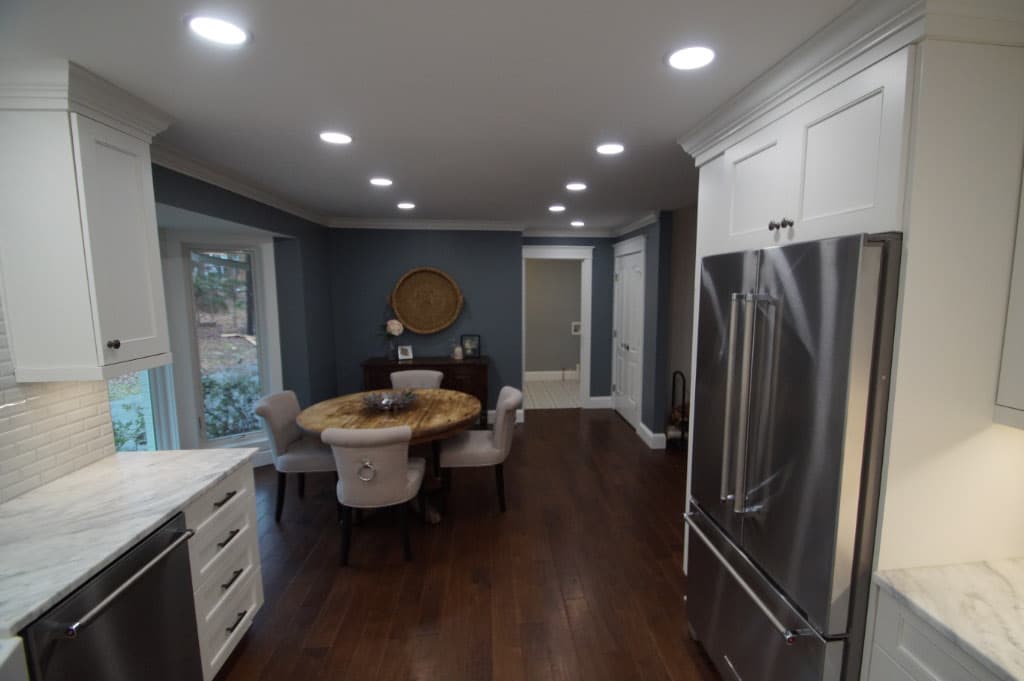 round kitchen table at end of kitchen remodel