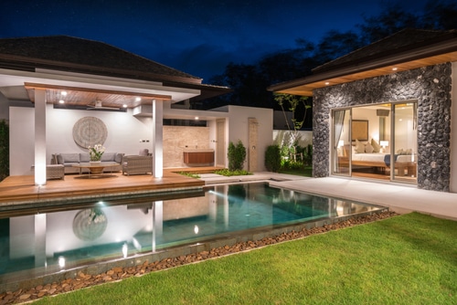 outdoor space with pool and lounge area