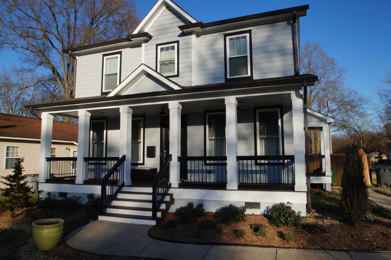 exterior home remodel with columned front porch