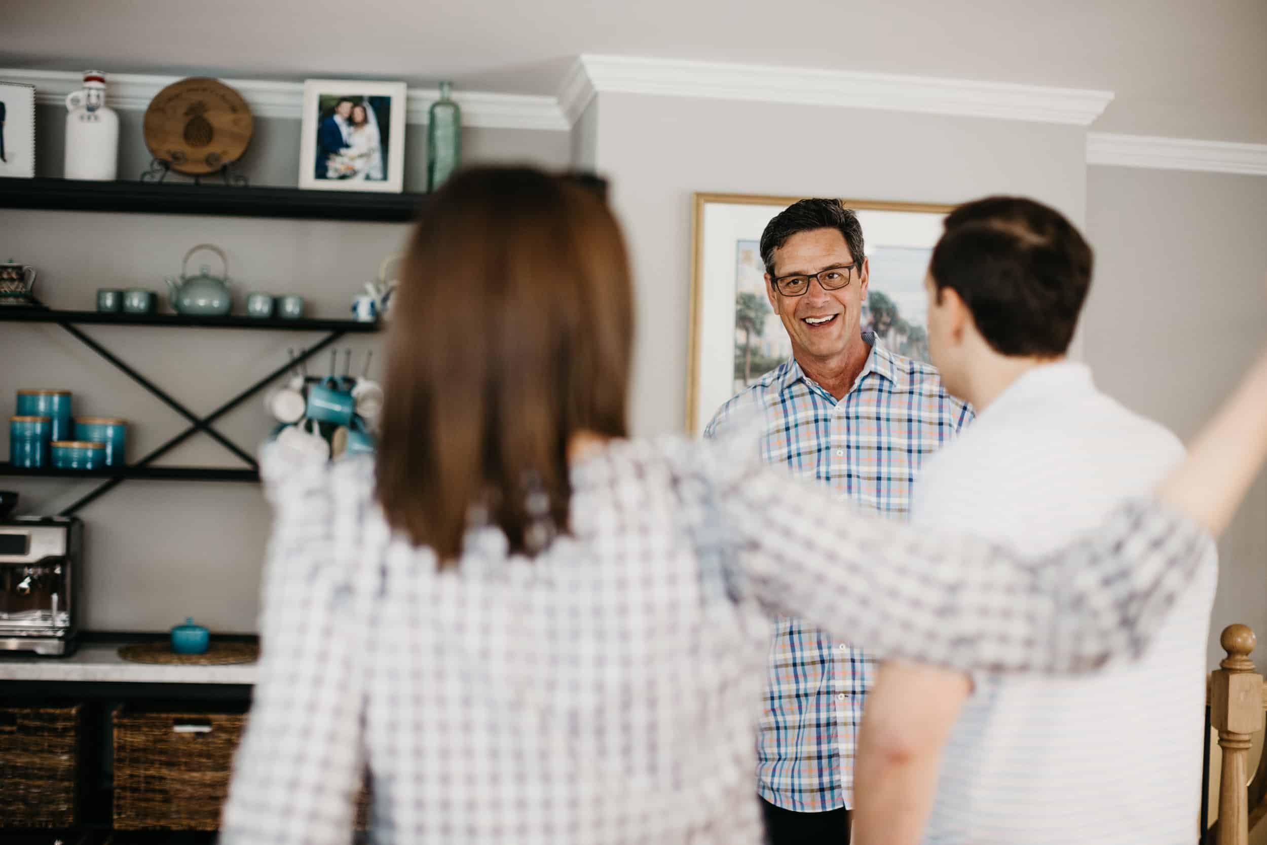 Gary Palmer speaking and smiling with clients