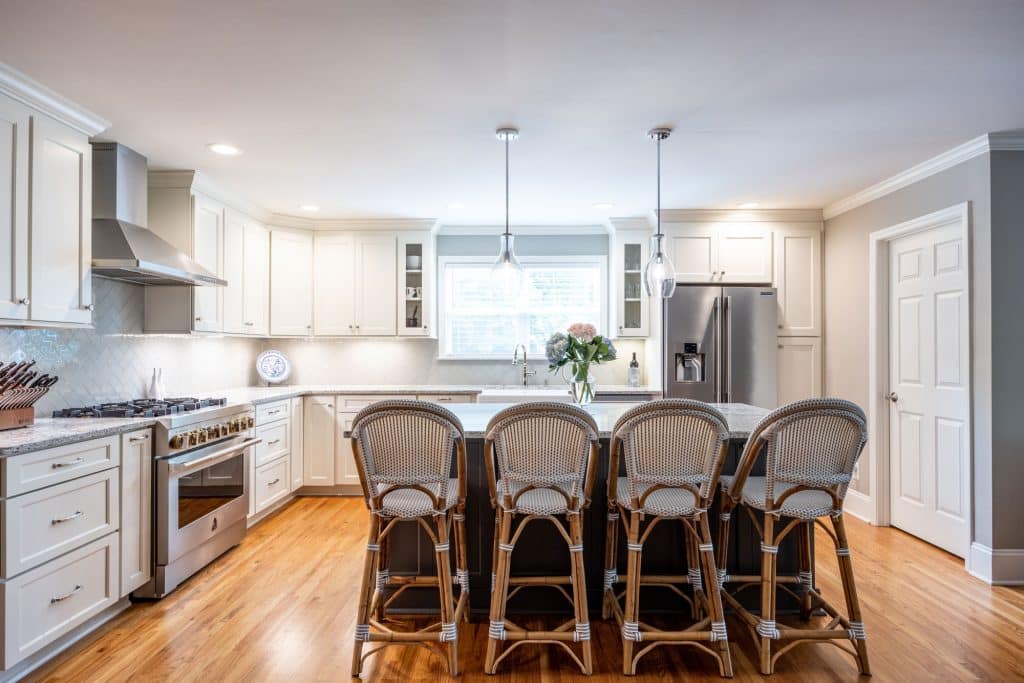 kitchen remodel with kitchen island and window over sink