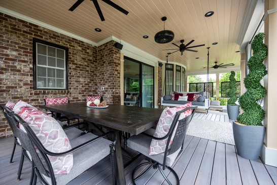 screened in porch with table