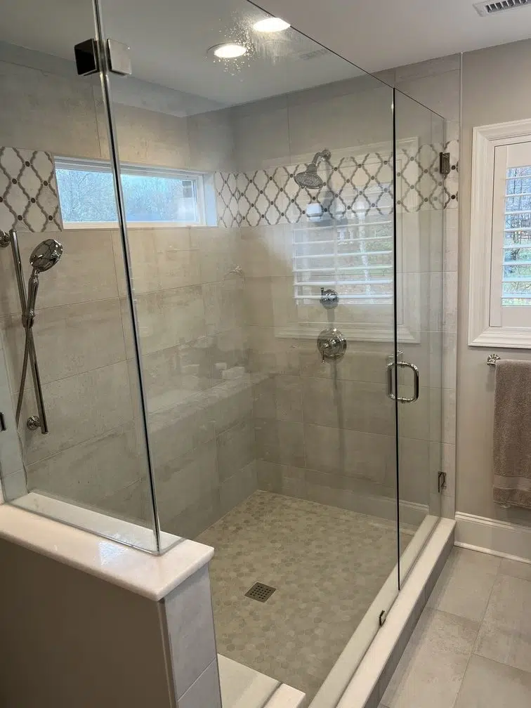 updated stand up glass shower with tile walls