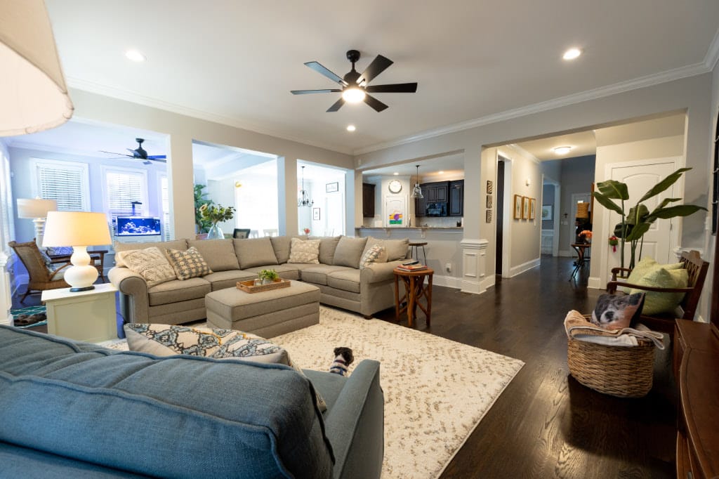 after photo of floor over of living room that once had high ceilings now had a lower ceiling for additional upstairs space