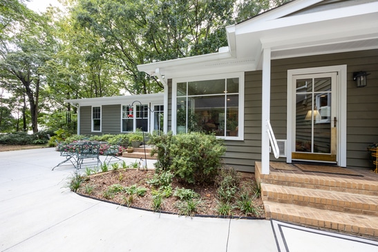 patio with steps to bedroom addition