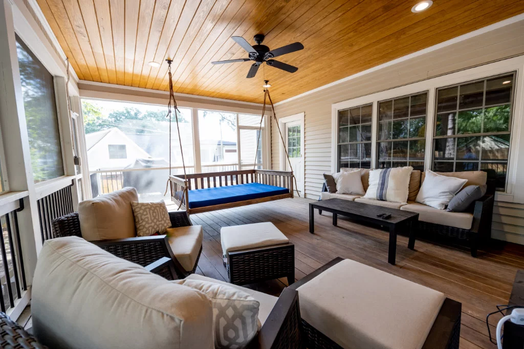 hanging porch swing in sunroom