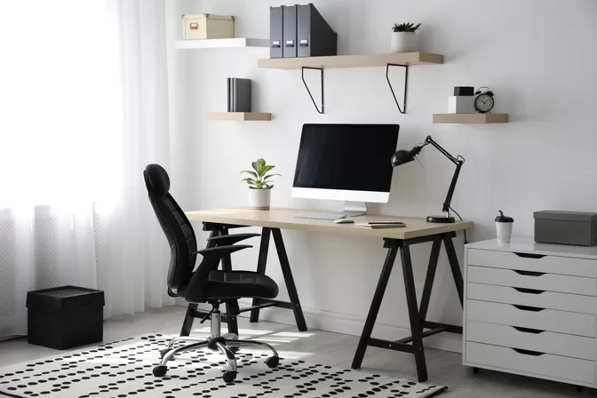 modern office desk with shelving above