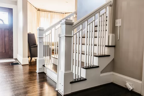 wooden stair renovation with white bannister