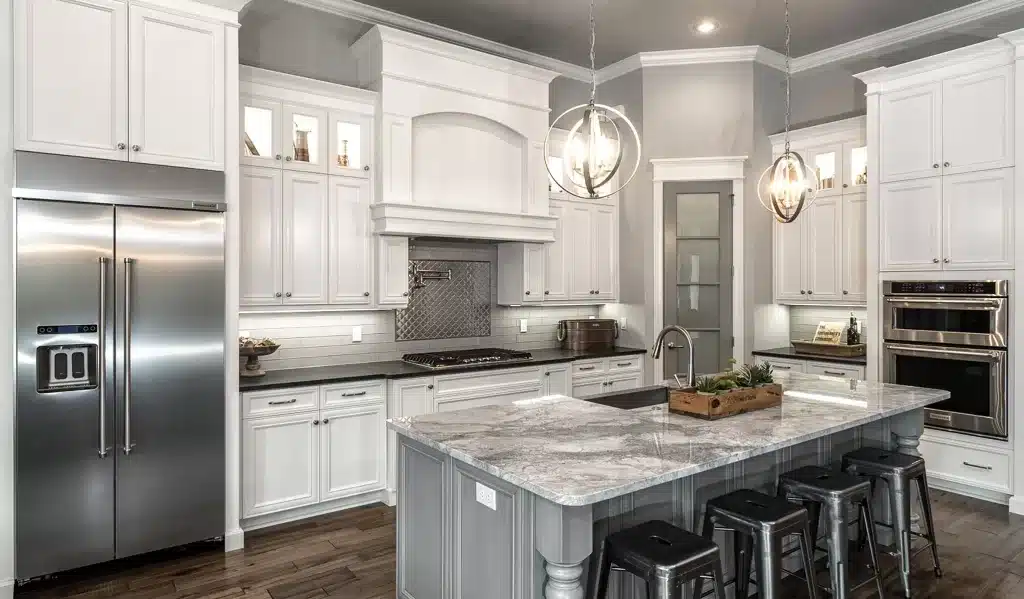 white kitchen cabinets with gray center island