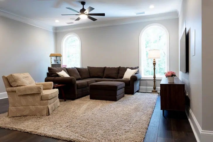 finished upstairs floor over that created a family room with couches and a tv upstairs