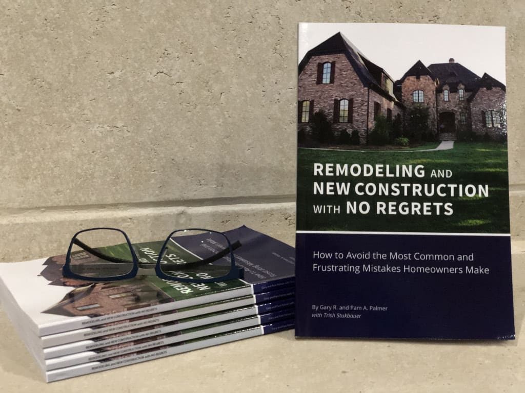 picture of copies of the book 'Remodeling and new construction with no regrets" written by Pam & Gary Palmer