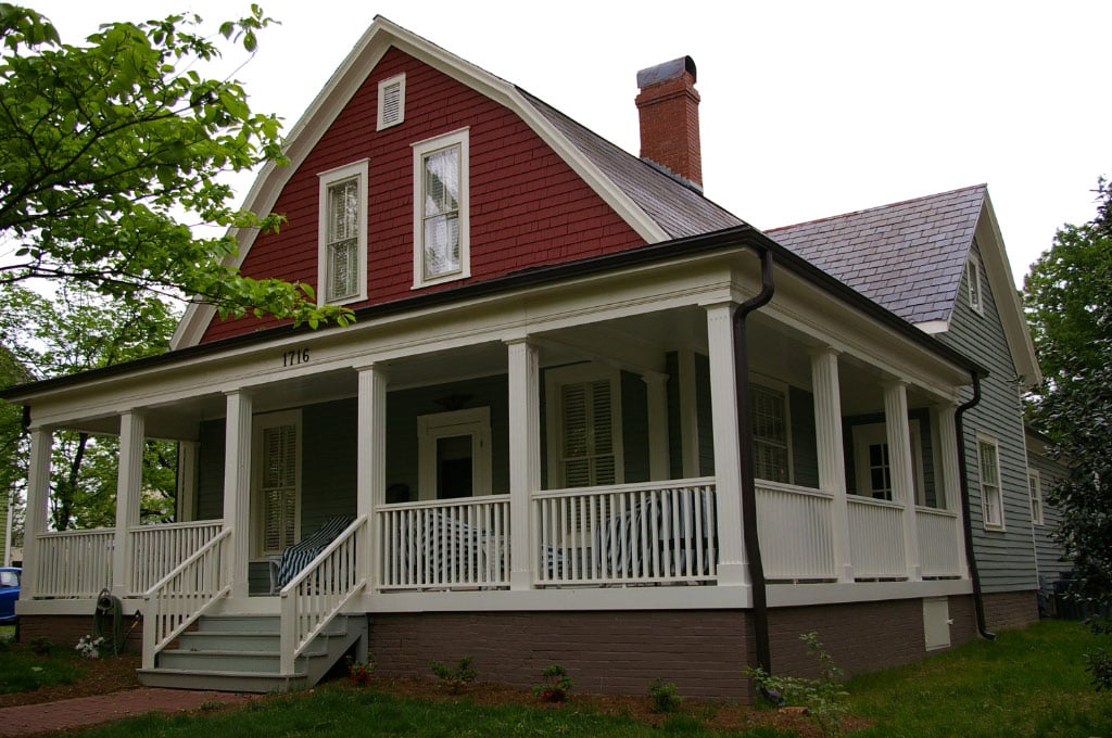 wrap around porch with columns in remodeled Charlotte home