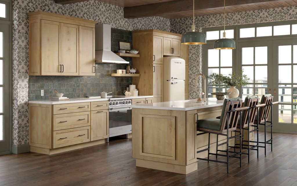light, natural wood kitchen with island with stool chairs. Natural stone backsplash.