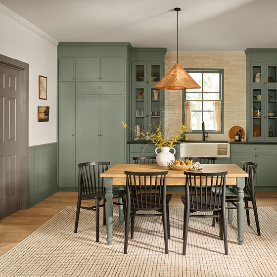 cottage style kitchen with sage green cabinets