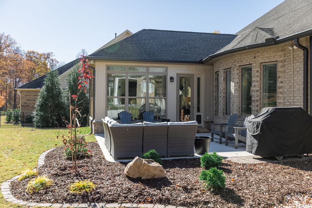 outdoor living area with couch and grill