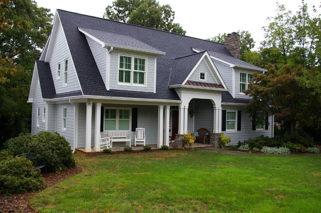 front of recently remodeled exterior with front yard with trees