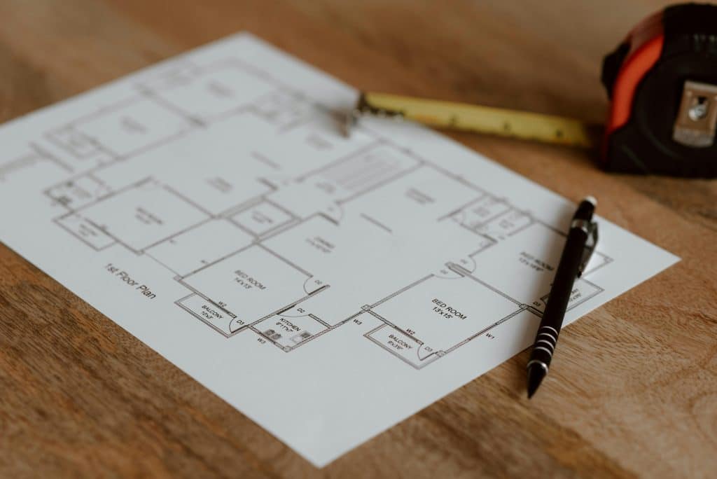 paper with architect's home remodeling plans