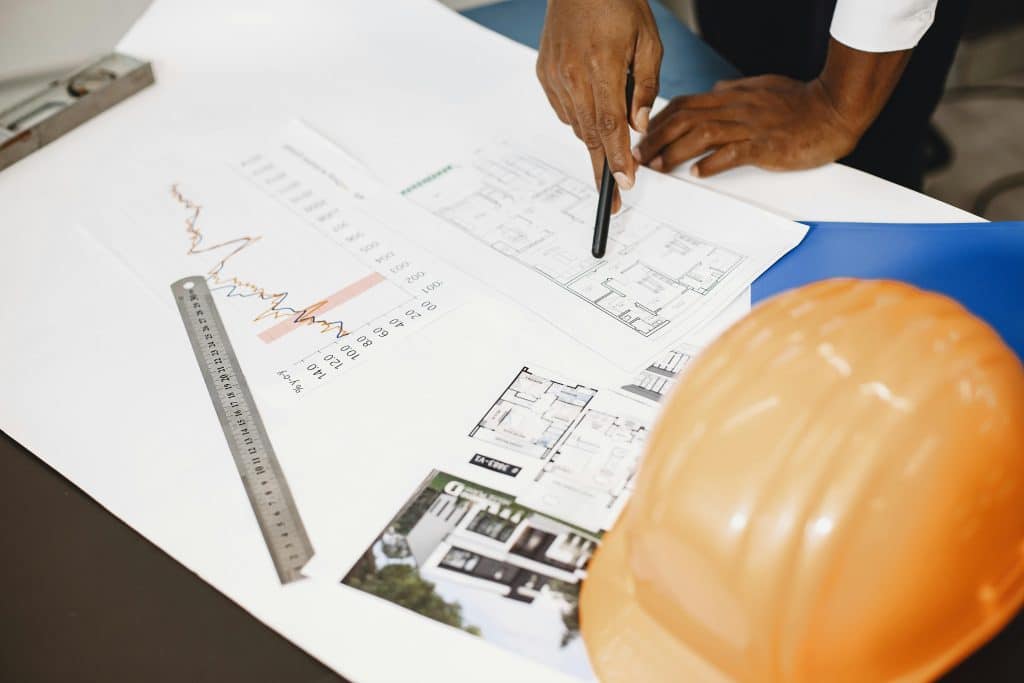 contractor drawing up home remodeling plans