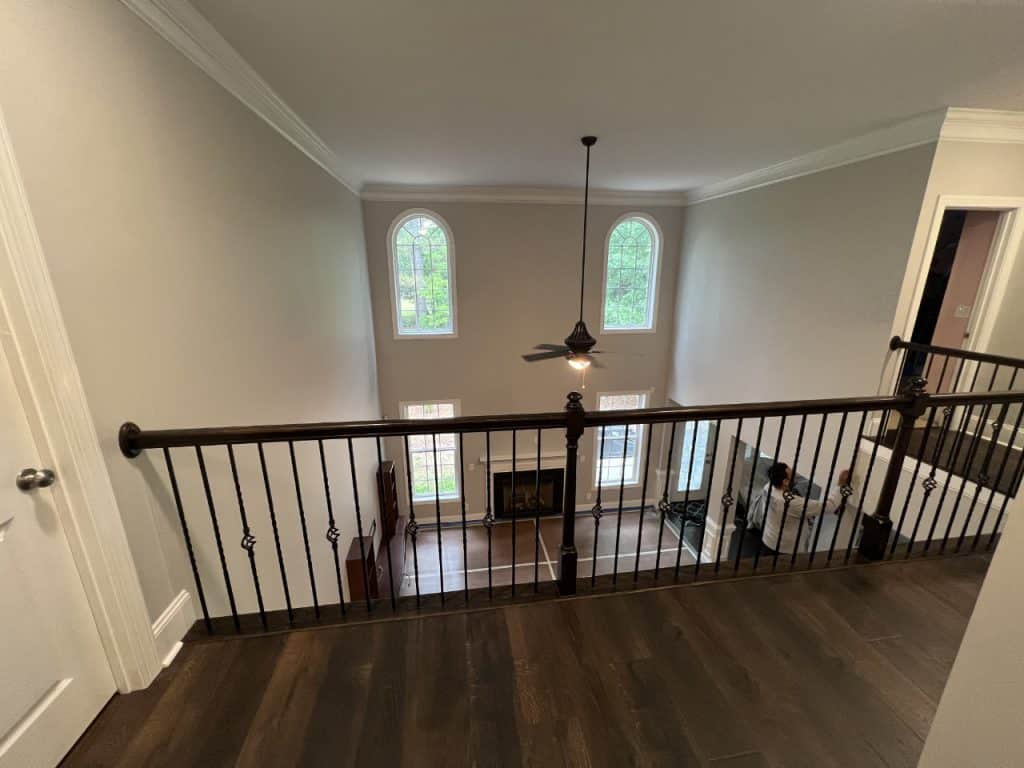 before floor over-two story landing over living room